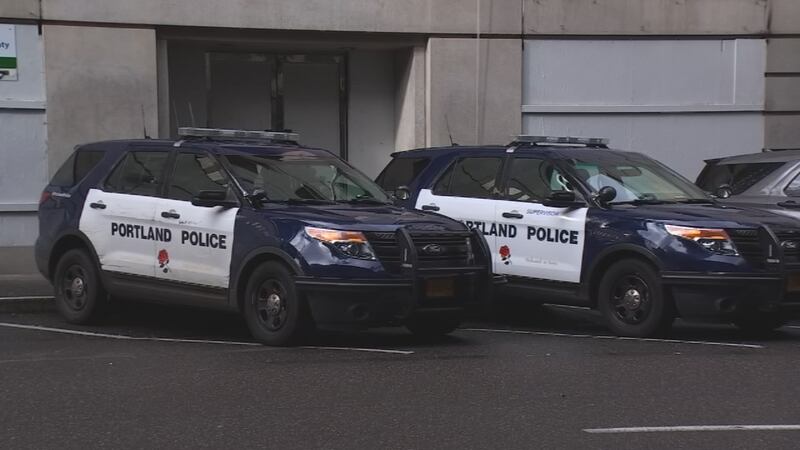Portland police patrol cars outside the bureau's building in downtown