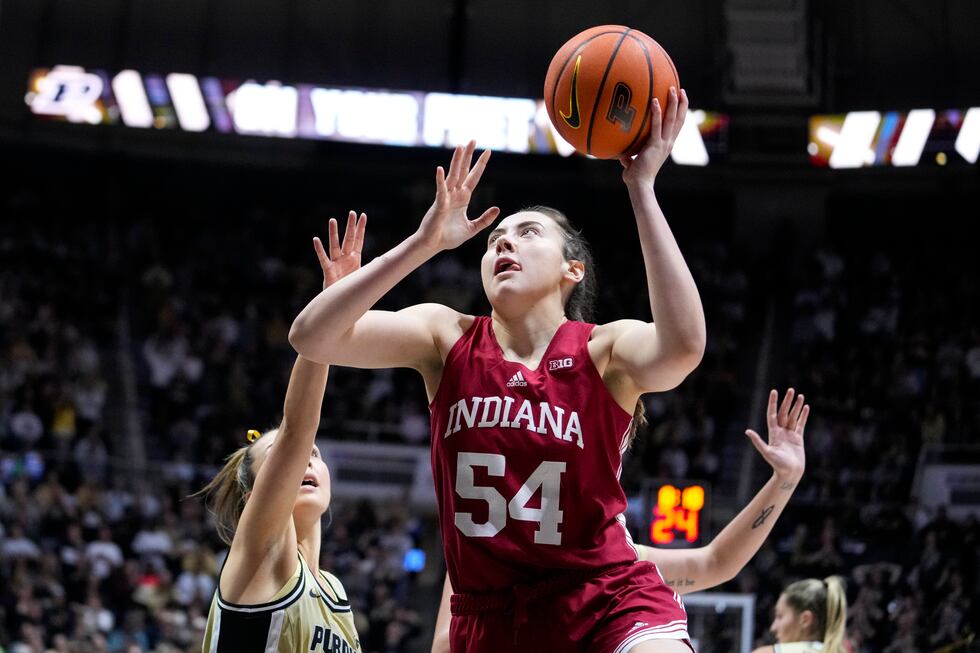 FILE - Indiana forward Mackenzie Holmes (54) shoots against Purdue in the first half of an...