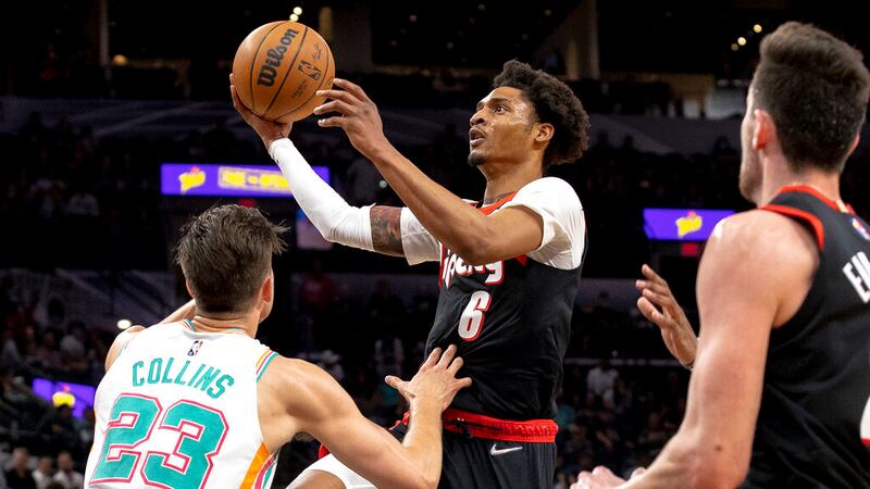 Portland Trail Blazers guard Keon Johnson (6) drives to the hoop against San Antonio Spurs...