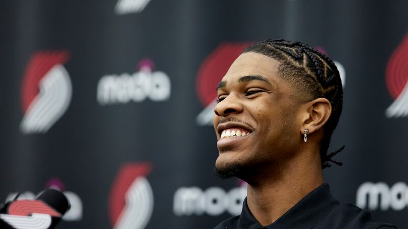 Portland Trail Blazers first round draft pick Scoot Henderson laughs during an NBA basketball...