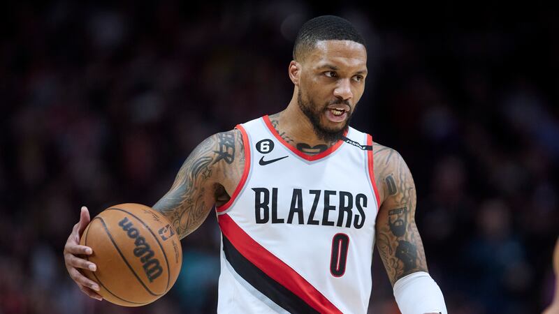 Portland Trail Blazers guard Damian Lillard brings the ball up against the New York Knicks...