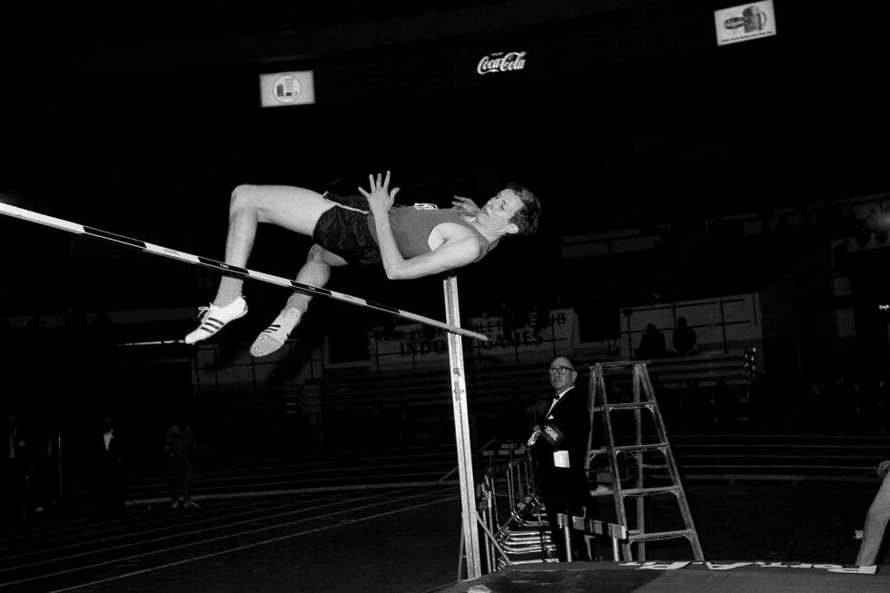 Dick Fosbury of Oregon State tries a seven foot two inch high jump with his head first style...