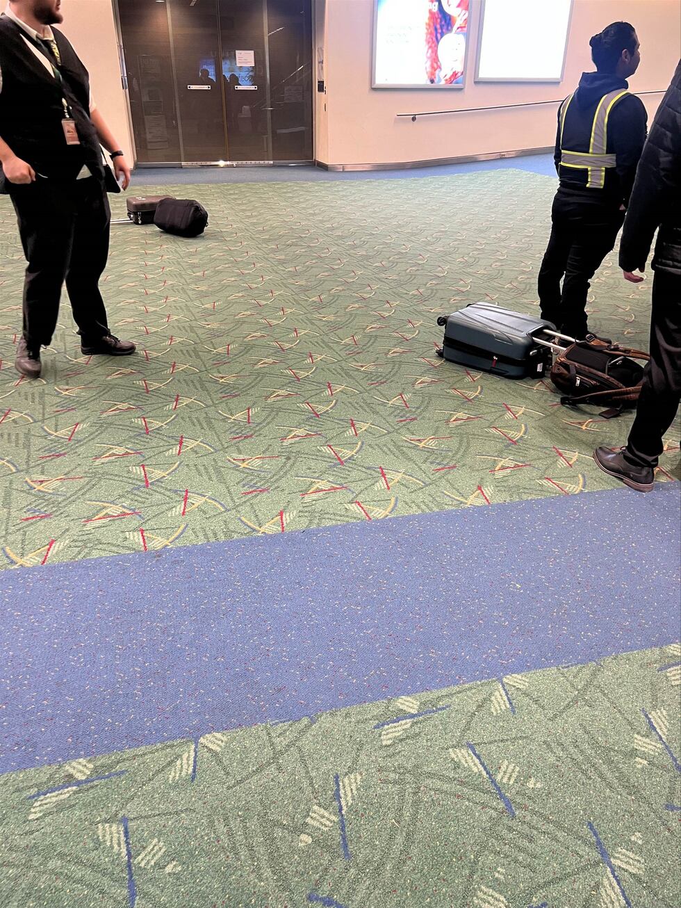 People dropped their luggage and fled for cover on Tuesday night as gunshots rang out in the...