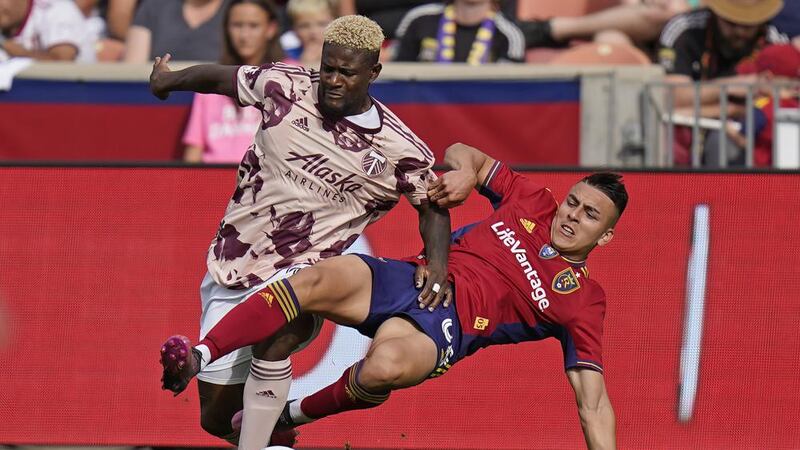 Portland Timbers forward Dairon Asprilla, left, and Real Salt Lake' Braian Ojeda, right,...
