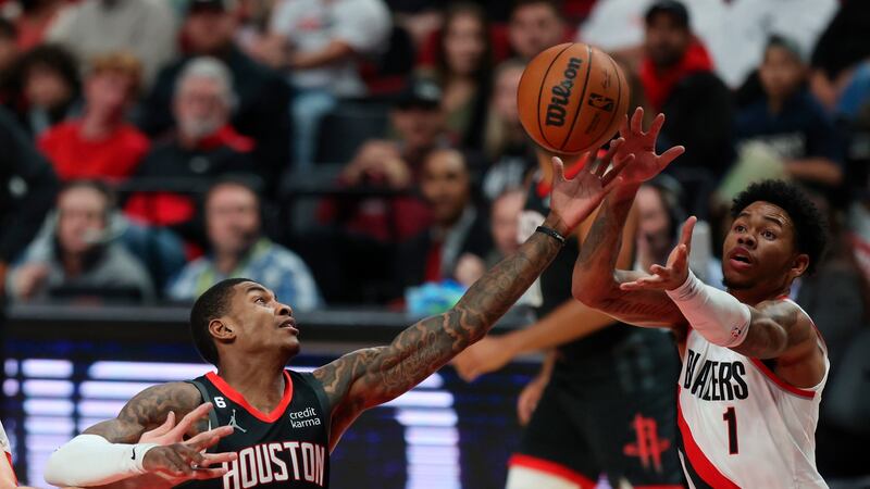 Houston Rockets guard Kevin Porter Jr., left, and Portland Trail Blazers guard Anfernee...
