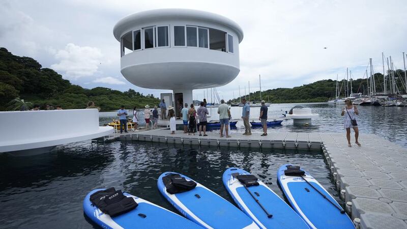 A SeaPod Eco prototype, the first of a futuristic line of homes built over water, is shown to...