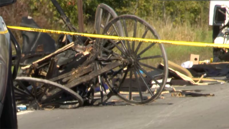 Two children died and four other people were injured when a pickup truck crashed into the rear...