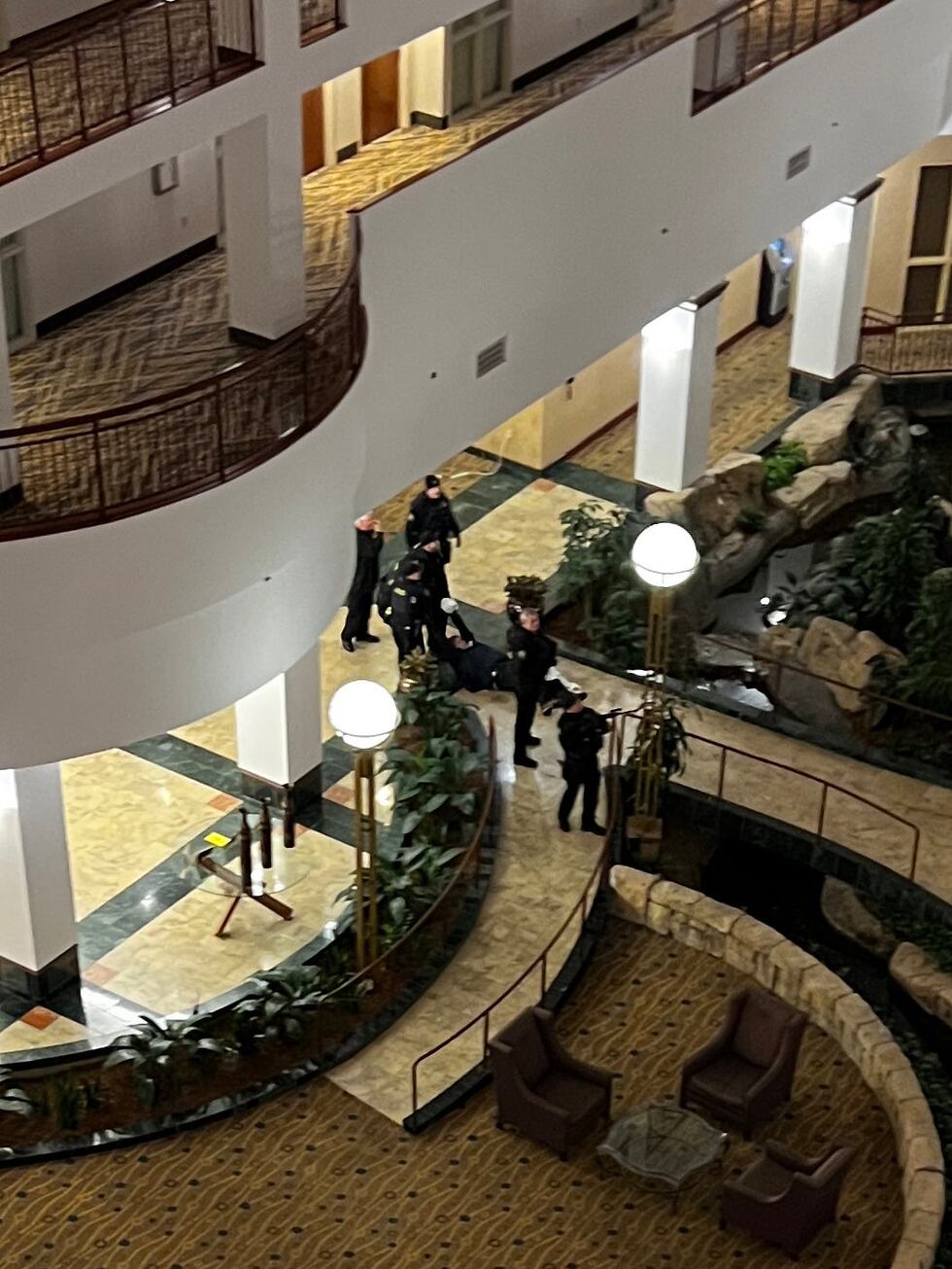 Officers in the lobby with a victim