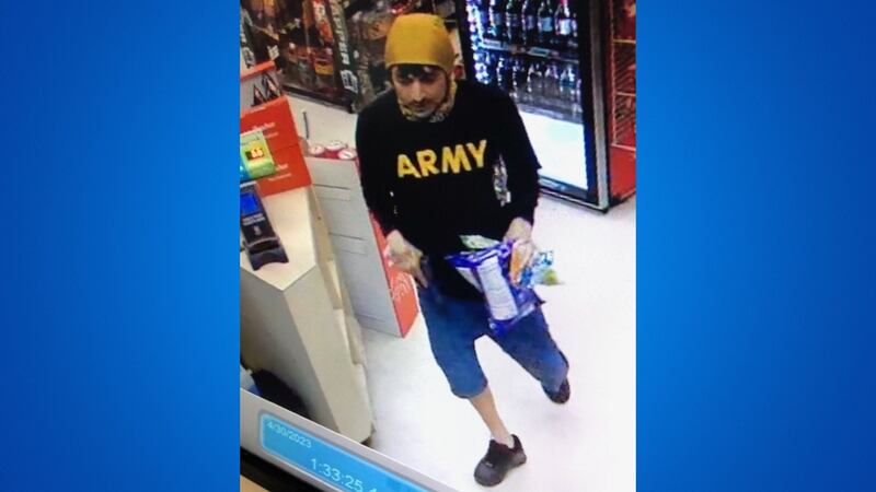 Armed robber caught on surveillance makes off with snacks from Portland store.