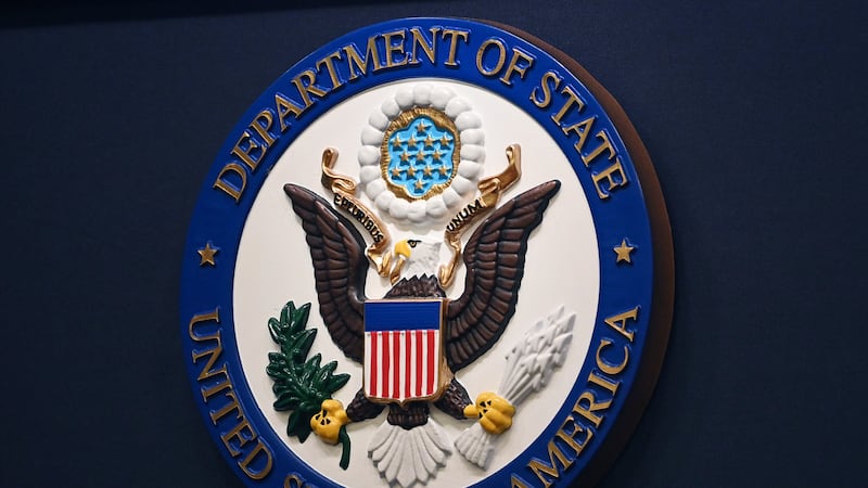 The State Department seal is seen on the briefing room lectern at the State Department in...