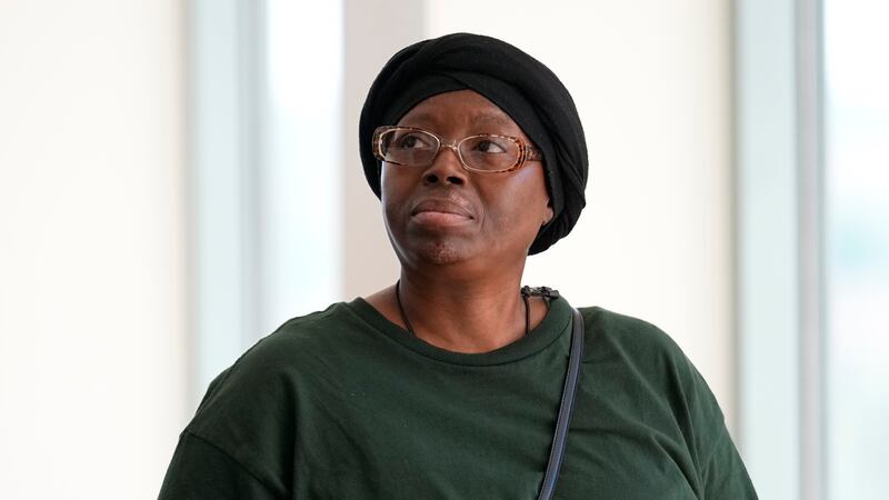 Sheneen McClain, mother of Elijah McClain, looks on outside the courtroom at the Adams County...