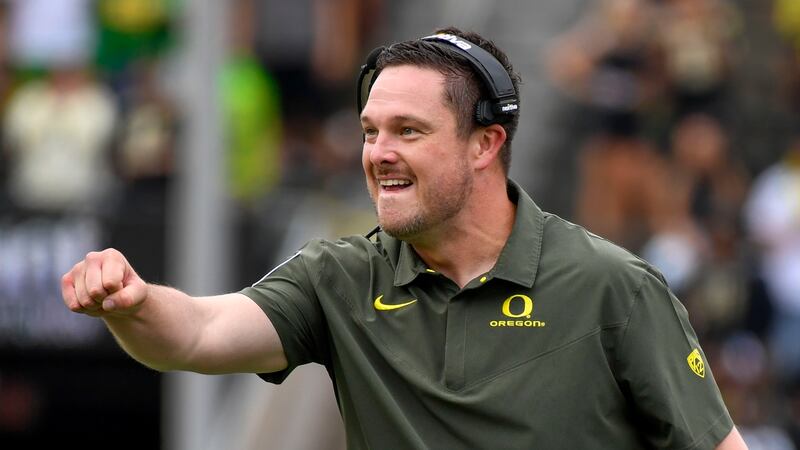 FILE - Oregon coach Dan Lanning reacts to a play against BYU during the first half of an NCAA...